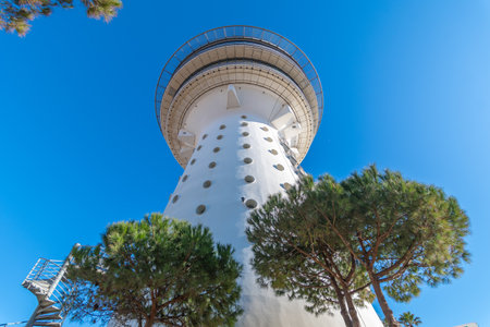 Lighthouse of the Mediterranean of the city of Palavas-les-Flots, in the south of France. Former water tower transformed into a panoramic restaurant.の写真素材