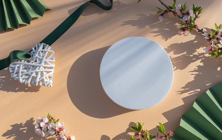 Flat lay, top view minimal summer composition with white round podium on beige backgroundの写真素材