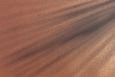 abstract of sunbeams on brown metal surface for background usedの写真素材