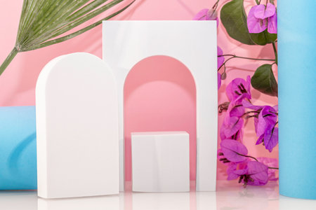 White podiums on a pink background with flowers. 3d renderingの写真素材