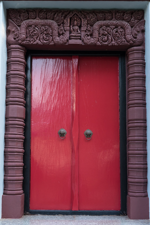 red ancient door at Prachuap khiri khan Lak Mueangの写真素材