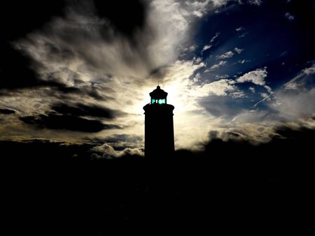lighthouse in backlightの写真素材