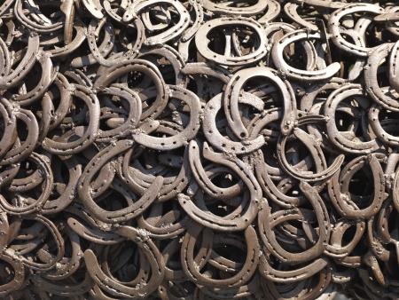  a bunch of welded horseshoes for luckの写真素材