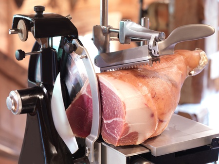 ham in cutting machine, old styleの写真素材