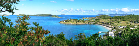 Panoramic landscape of tropical marine blue lagoon with wild green jungle in the foreground. High...