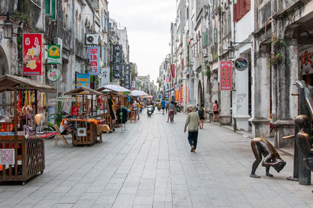 BEIHAI, CHINA - JUN, 2013: Old town street in Beihai, China, with dilapidated houses in the style of colonial architecture.のeditorial素材