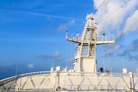 Navigation radar installations of the ship against the blue skyの写真素材