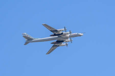 MOSCOW, RUSSIA - JUN 2020: Soviet and Russian turboprop strategic bomber TU-95MS (Bear), the world's fastest turboprop aircraft at the parade in honor of the 75th anniversary of the victory.のeditorial素材