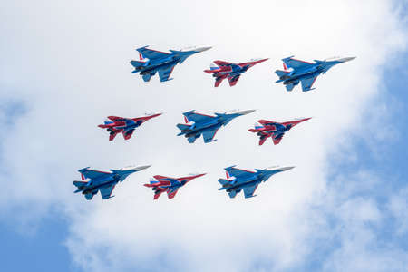 MOSCOW, RUSSIA - JUN 2020: Su-30SM (Russian Knights aerobatic team) and MiG-29 (Swifts aerobatic...