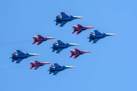 MOSCOW, RUSSIA - JUN 2020: Su-30SM (Russian Knights aerobatic team) and MiG-29 (Swifts aerobatic...