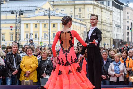 MOSCOW, RUSSIA - SEPTEMBER, 2017: Amateur dancers demonstrate their art of ballroom dancing on the central street of Moscow on City Day. Classic slow waltz.のeditorial素材