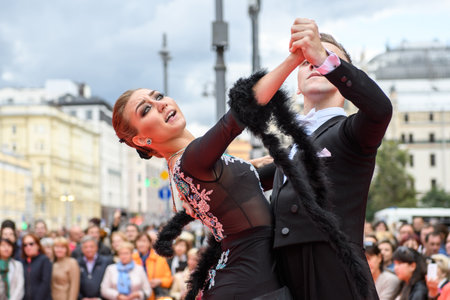 MOSCOW, RUSSIA - SEPTEMBER, 2017: Amateur dancers demonstrate their art of ballroom dancing on the central street of Moscow on City Day. sensual tango.のeditorial素材