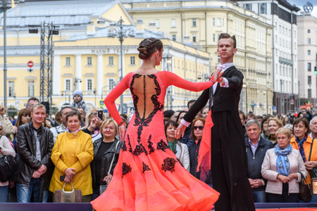 MOSCOW, RUSSIA - SEPTEMBER, 2017: Amateur dancers demonstrate their art of ballroom dancing on the central street of Moscow on City Day. Classic slow waltz.のeditorial素材