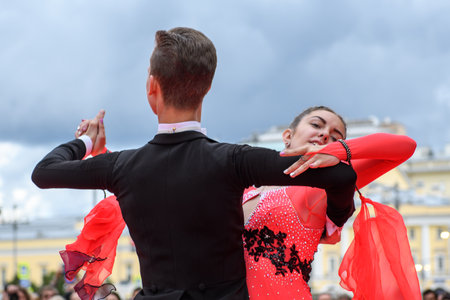 MOSCOW, RUSSIA - SEPTEMBER, 2017: Amateur dancers demonstrate their art of ballroom dancing on the central street of Moscow on City Day. Classic slow waltz.のeditorial素材