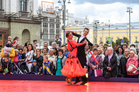 MOSCOW, RUSSIA - SEPTEMBER, 2017: Amateur dancers demonstrate their art of ballroom dancing on the central street of Moscow on City Day. Classic slow waltz.のeditorial素材