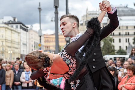 MOSCOW, RUSSIA - SEPTEMBER, 2017: Amateur dancers demonstrate their art of ballroom dancing on the central street of Moscow on City Day. sensual tango.のeditorial素材