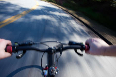 Speed bicycle on the roadの写真素材
