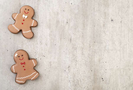Traditional christmas gingerbread over a wooden table with copy space.