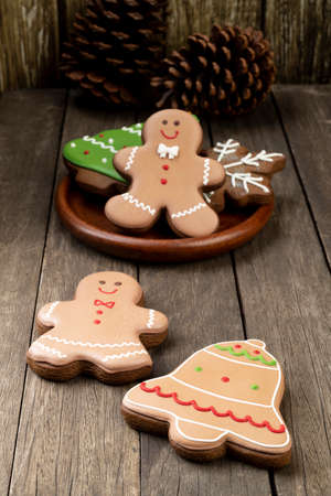 Traditional christmas gingerbread over a wooden table.