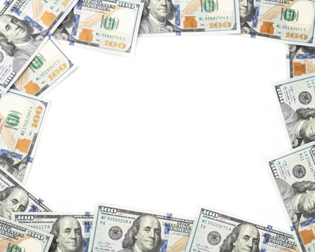 Hundred dollar bills over white background with copy space.の写真素材