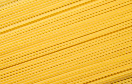 Top view, closeup of spaghetti pasta. Food backdrop.の写真素材