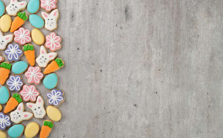 Easter cookies over light gray background with copy space.の写真素材
