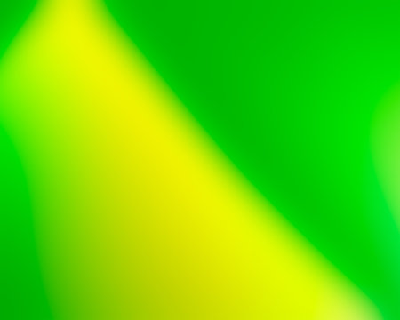 Unfocused green and yellow backdrop. Brazilian flag colors abstract texture.の写真素材