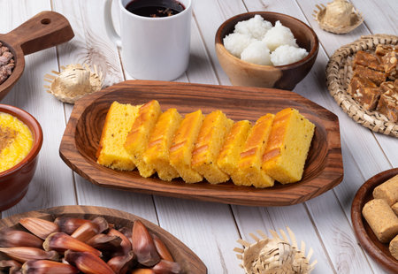 Typical brazilian june festival food over white wooden table. June celebration.
