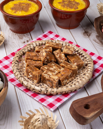 Typical brazilian june festival food over white wooden table. June celebration.