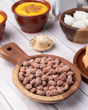 Typical brazilian june festival food over white wooden table. June celebration.