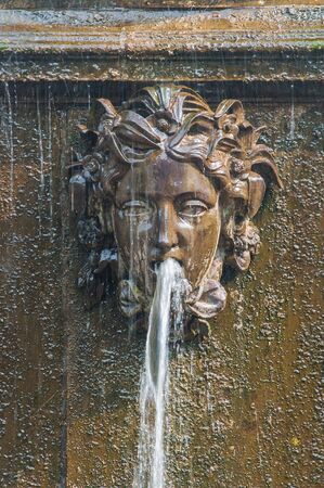 Peterhof Palace St Petersburg, Russia. Masque - detail of a fountain in Upper Garden. The Peterhof Palace included in the Unesco'S World Heritage list.のeditorial素材