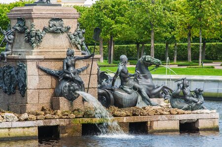 Peterhof Palace St Petersburg, Russia. Details of Neptune fountain in Upper Garden. The Peterhof Palace included in the Unesco'S World Heritage list.のeditorial素材