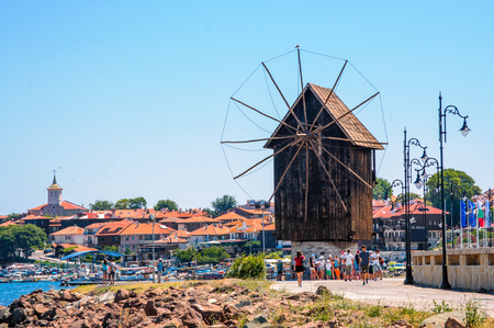 Panorama of Nesebar Windmill and Old City panorama in the background. Bulgaria. Black sea. Sunny beachの写真素材