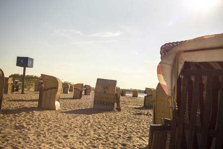 Beach chairs on the Baltic sea beach in sunlightの写真素材