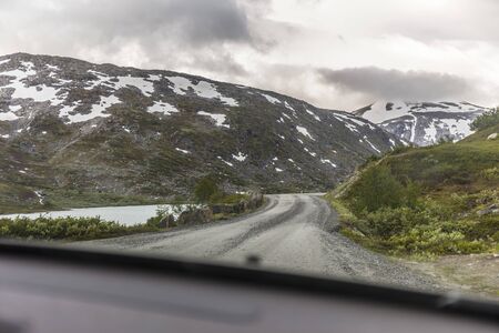 on the way on the tourist landscape routes in Norway, a masterpiece of engineering design from a...