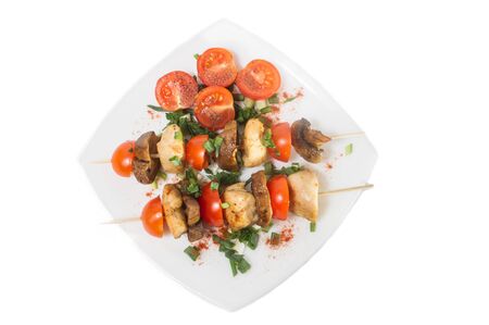 Roasted chicken with mushrooms and tomatoes  Isolated の写真素材