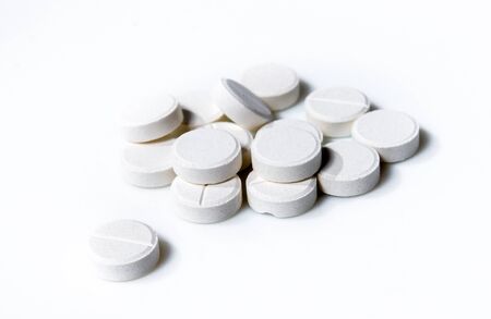 white pills on white background. Isolated.の写真素材