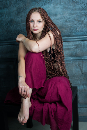 beautiful young woman with dreadlocksの写真素材