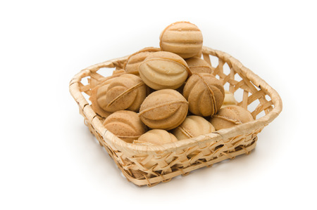 wafer nuts with cream in a basket. isolated.