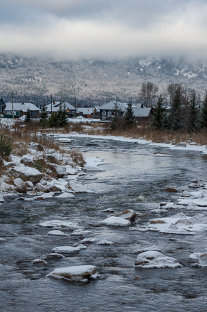 a cold mountain stream flows at the foot of the Zigalga Rangeの写真素材