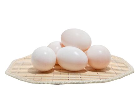Organic duck eggs on woodの写真素材