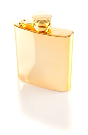 Golden Hip Flask reflection  on isolated white の写真素材