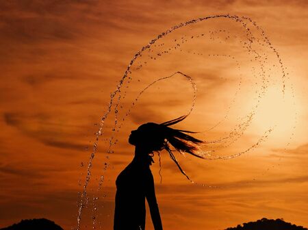 Dancing in the sunset drops. Siam bay. Province Trat. Koh Chang island. Kingdom Thailandの写真素材