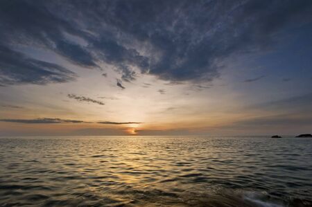 Sunset on the rocks. Siam bay. Province Trat. Koh Chang island. Kingdom Thailand