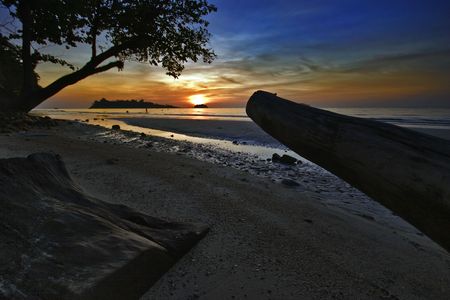 Sunset on tropical beach. Siam bay. Province Trat. Koh Mak island. Kingdom Thailandの写真素材