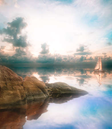 Beautiful boat at sunset in the lakeの写真素材