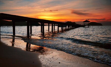 Sunset on tropical beach. Siam bay. Province Trat. Koh Chang island. Kingdom Thailandの写真素材