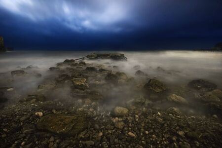 Stormy night on the stones beach. Budva. Montenegroの写真素材