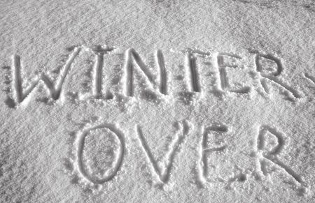 Winter over? Texture of white snow with Inscription の写真素材
