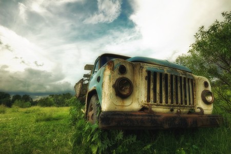 Old lorry in the fieldの写真素材